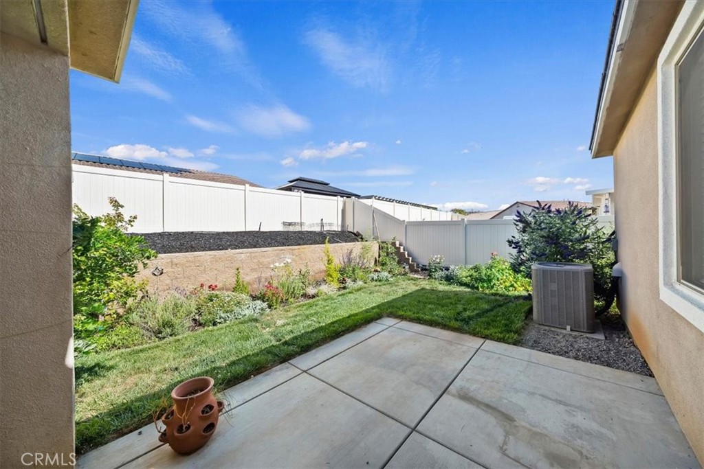 12766 Blush Court Riverside, CA 92503 - Photo 49 of 55 a front view of a building with garden