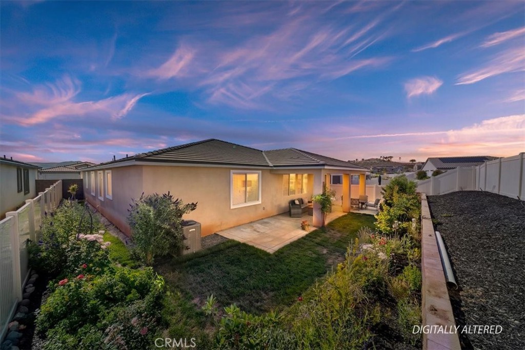 12766 Blush Court Riverside, CA 92503 - Photo 50 of 55 a view of a house with a yard