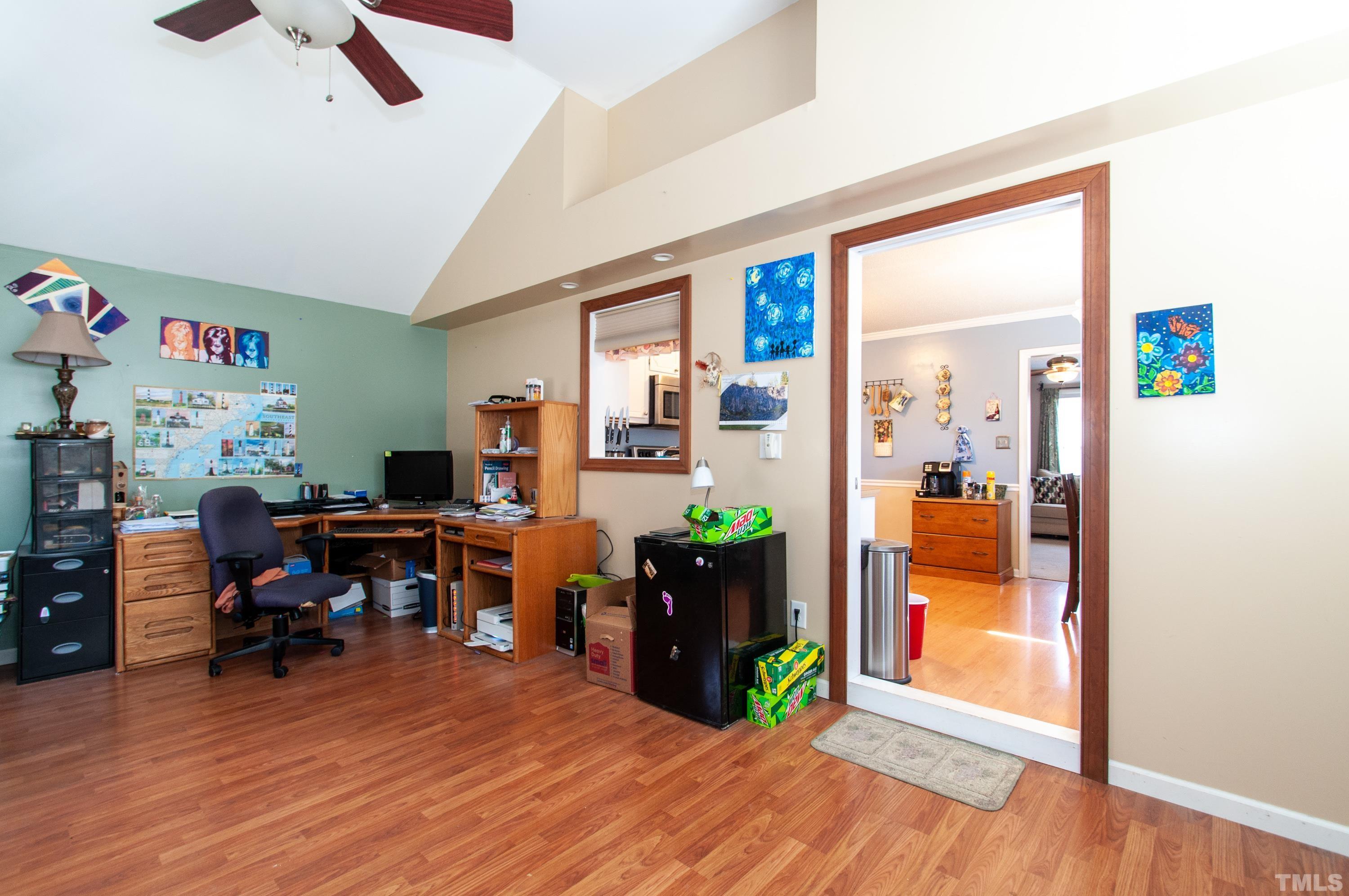 3605 Castlegate Drive Raleigh, NC 27616 - Photo 8 of 18 a living room with furniture and a gate