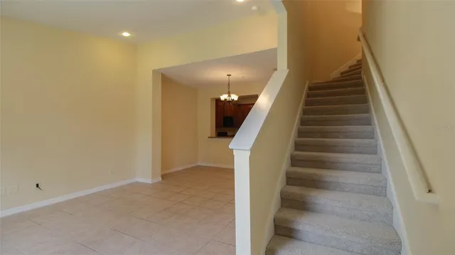 a view of a hallway with staircase