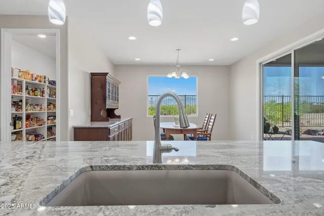 a workspace with furniture and a window