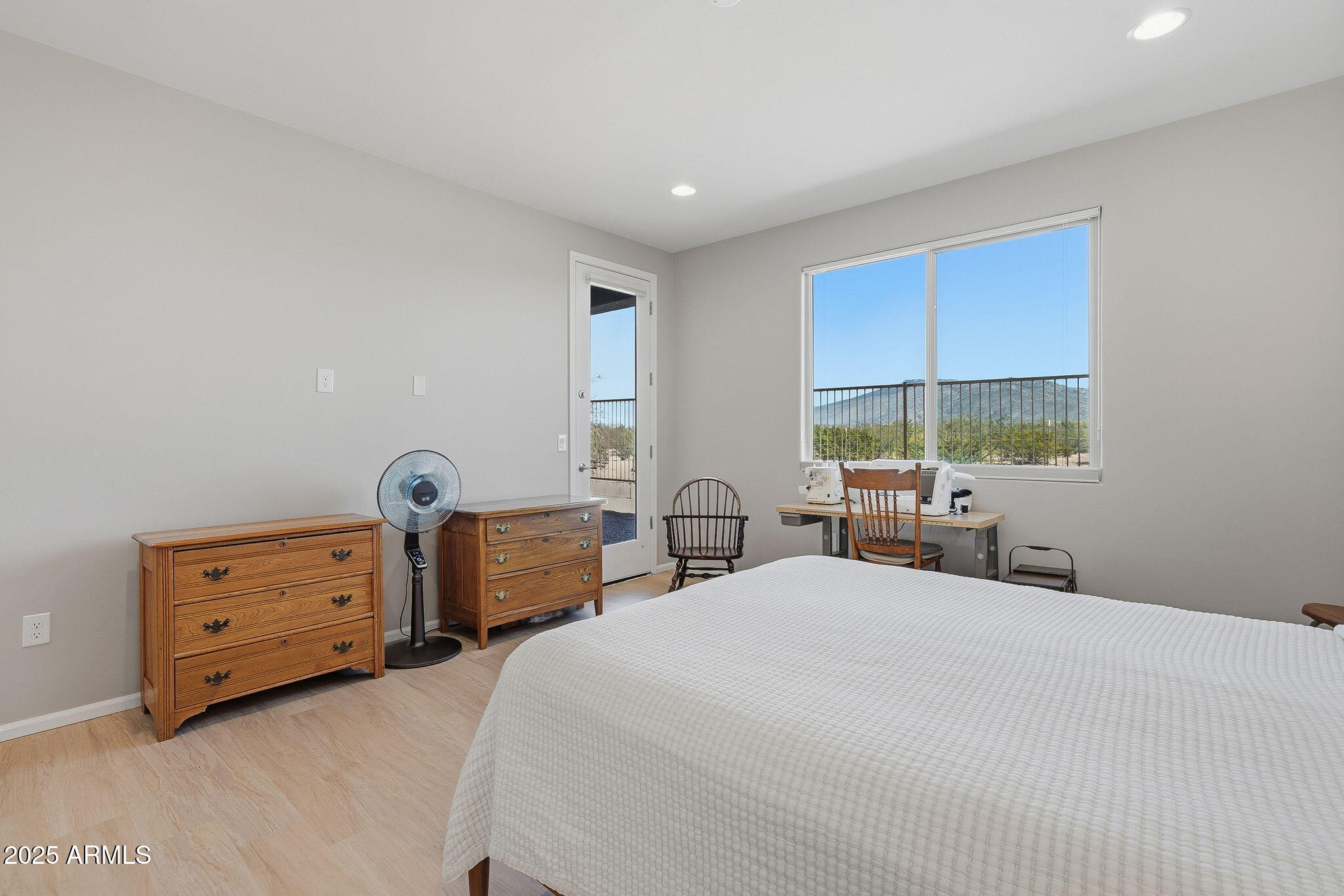 5439 South Sierra Prieta Trail Tucson, AZ 85747 - Photo 19 of 71 a bedroom with a bed and a window