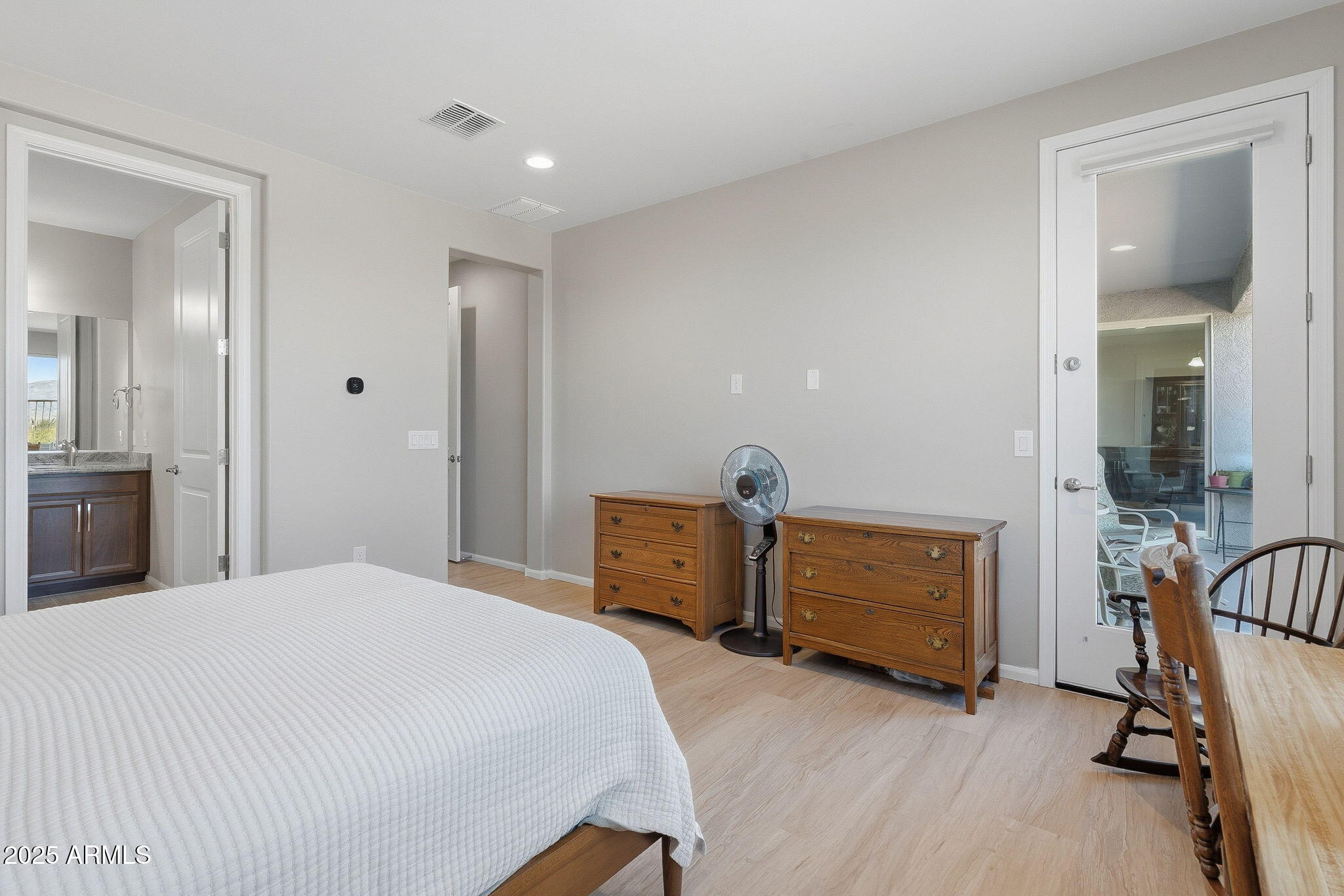 5439 South Sierra Prieta Trail Tucson, AZ 85747 - Photo 22 of 71 a bedroom with a bed and a desk