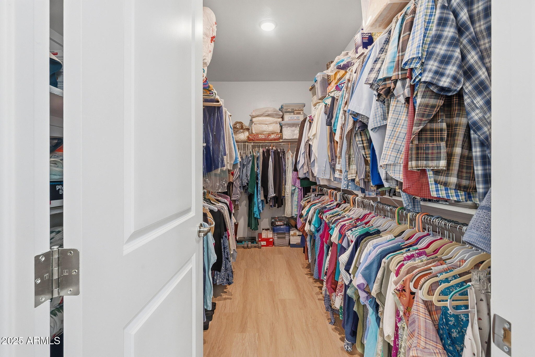 5439 South Sierra Prieta Trail Tucson, AZ 85747 - Photo 24 of 71 a view of walk in closet with clothes