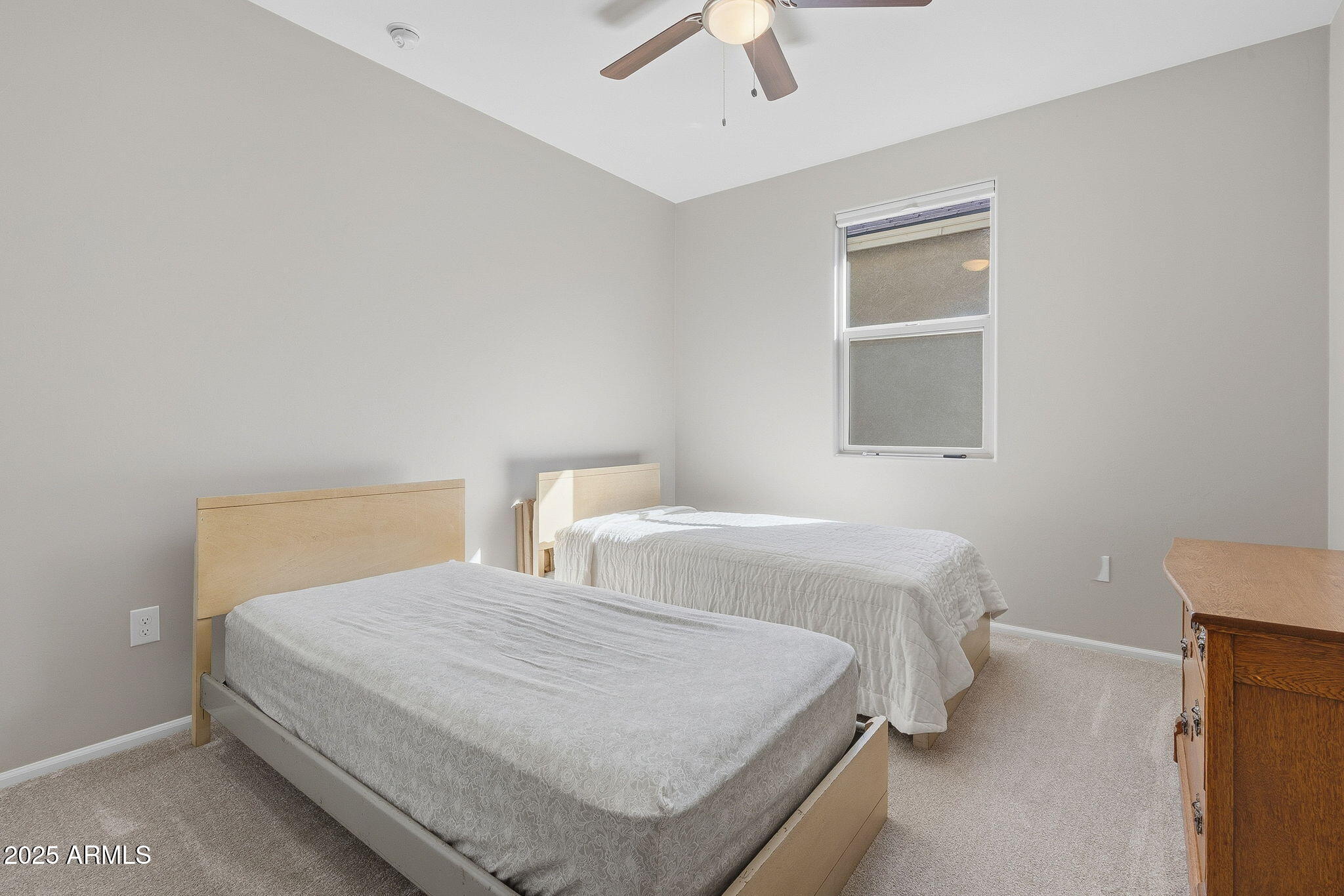 5439 South Sierra Prieta Trail Tucson, AZ 85747 - Photo 27 of 71 a bedroom with a bed and a window