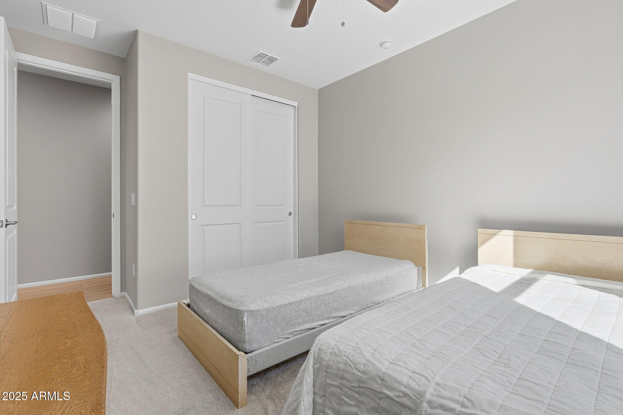 5439 South Sierra Prieta Trail Tucson, AZ 85747 - Photo 28 of 71 a bedroom with two beds and painted walls