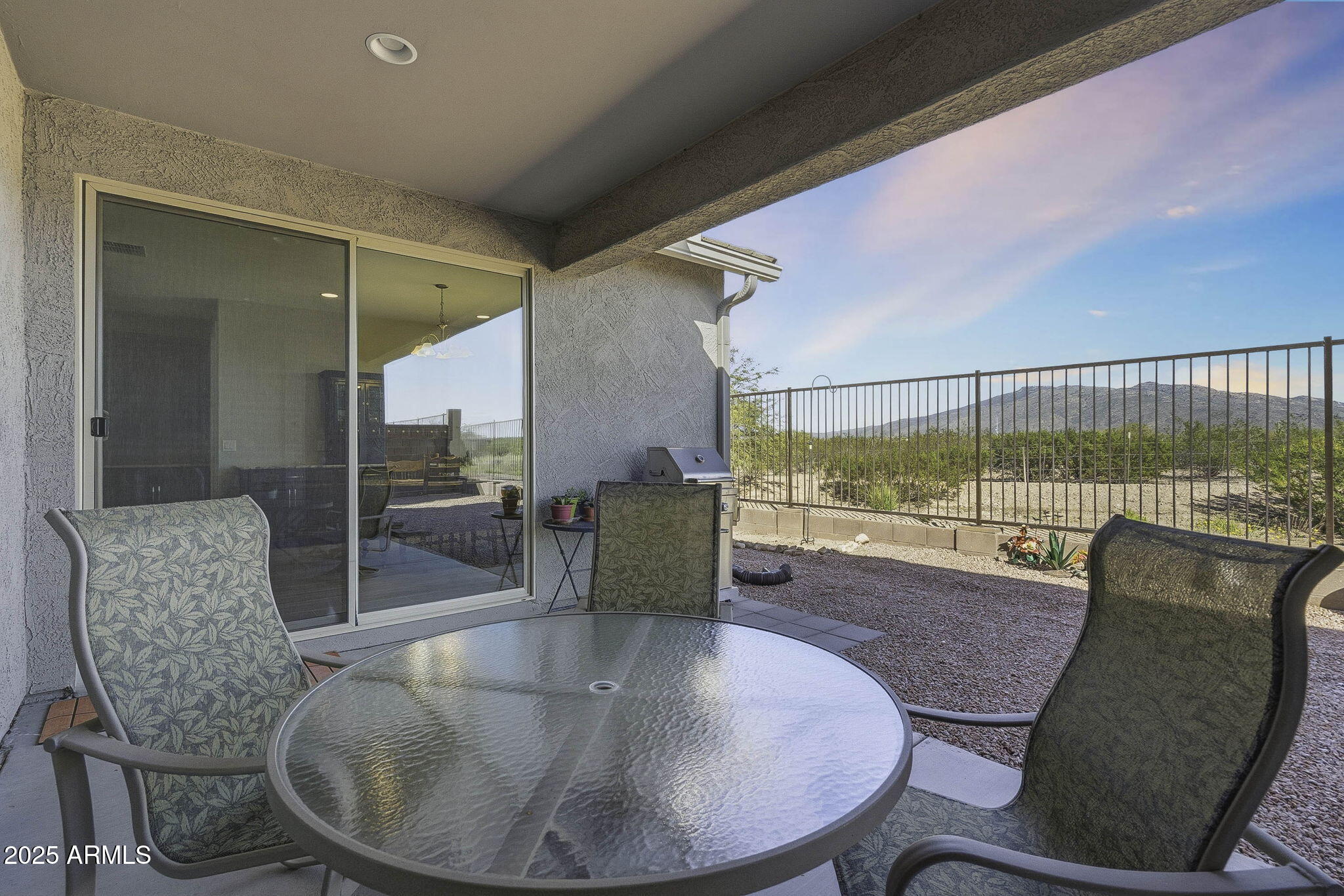 5439 South Sierra Prieta Trail Tucson, AZ 85747 - Photo 32 of 71 a dining room with furniture and wooden floor