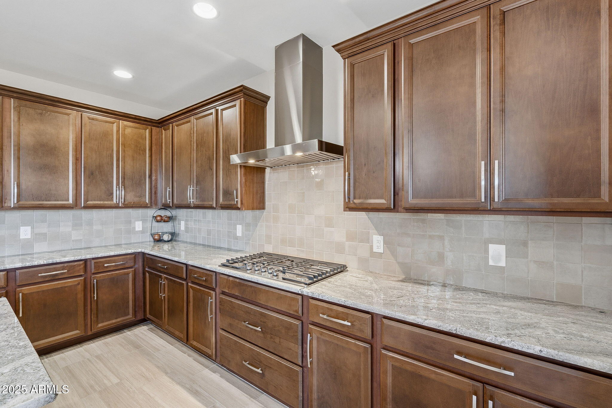 5439 South Sierra Prieta Trail Tucson, AZ 85747 - Photo 56 of 71 a kitchen with stainless steel appliances granite countertop a sink stove and cabinets