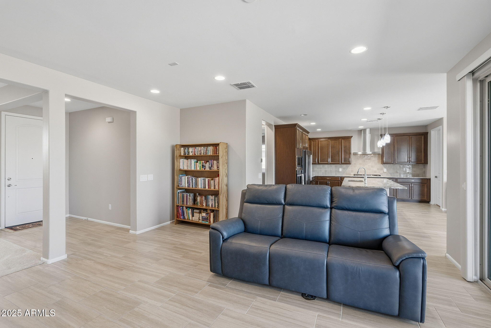 5439 South Sierra Prieta Trail Tucson, AZ 85747 - Photo 7 of 71 a living room with furniture and kitchen view