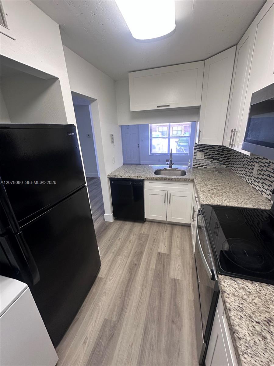 10049 Winding Lake Road, Unit 103 Sunrise, FL 33351 - Photo 4 of 8 Gallery Image 4
