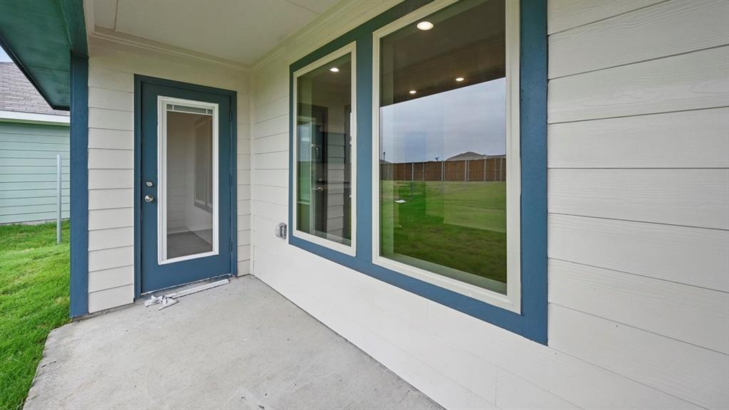 3925 Oakcrest Lane Princeton, TX 75407 - Photo 35 of 35 a view of a glass door with a yard from balcony