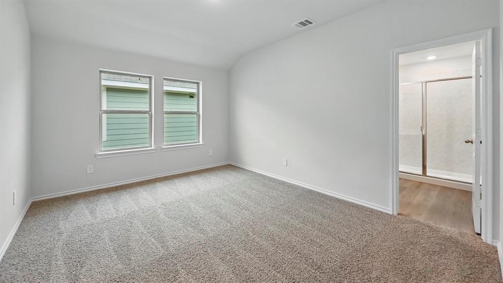 3925 Oakcrest Lane Princeton, TX 75407 - Photo 8 of 35 an empty room with windows and closet