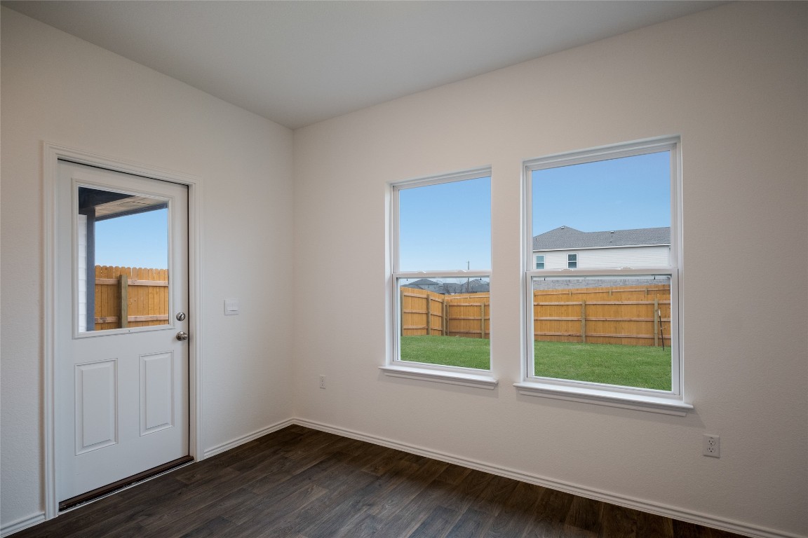 15009 Welsh Cob St Manor, Unit A Manor, TX 78653 - Photo 13 of 24 an empty room with windows and closet