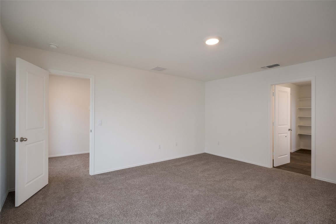 15009 Welsh Cob St Manor, Unit A Manor, TX 78653 - Photo 16 of 24 a view of empty room