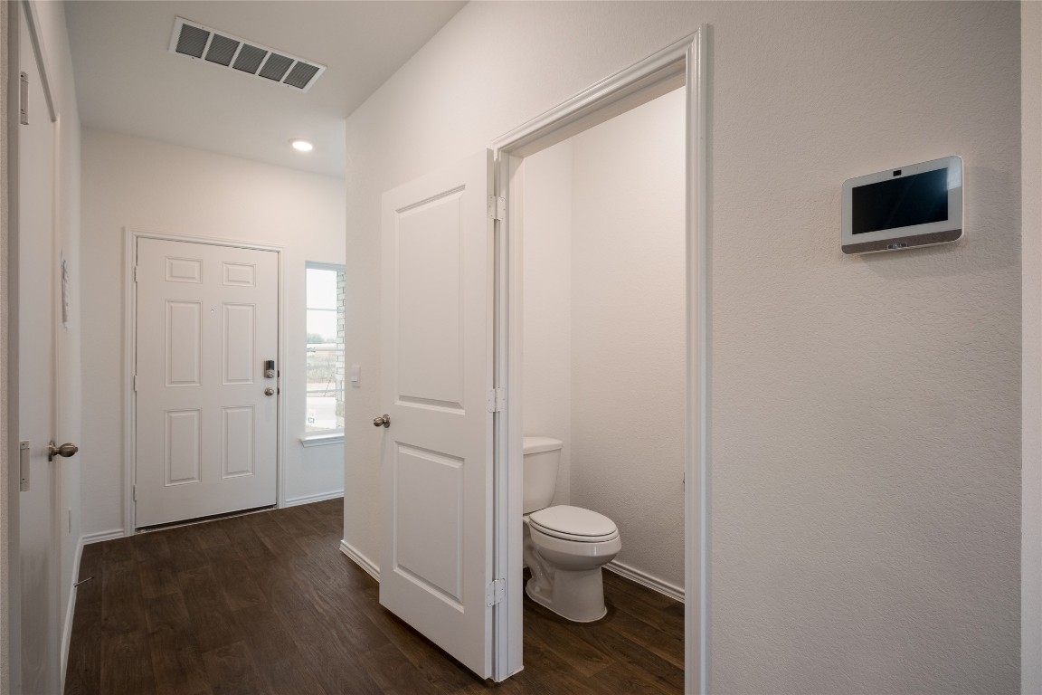 15009 Welsh Cob St Manor, Unit A Manor, TX 78653 - Photo 5 of 24 a bathroom with a toilet