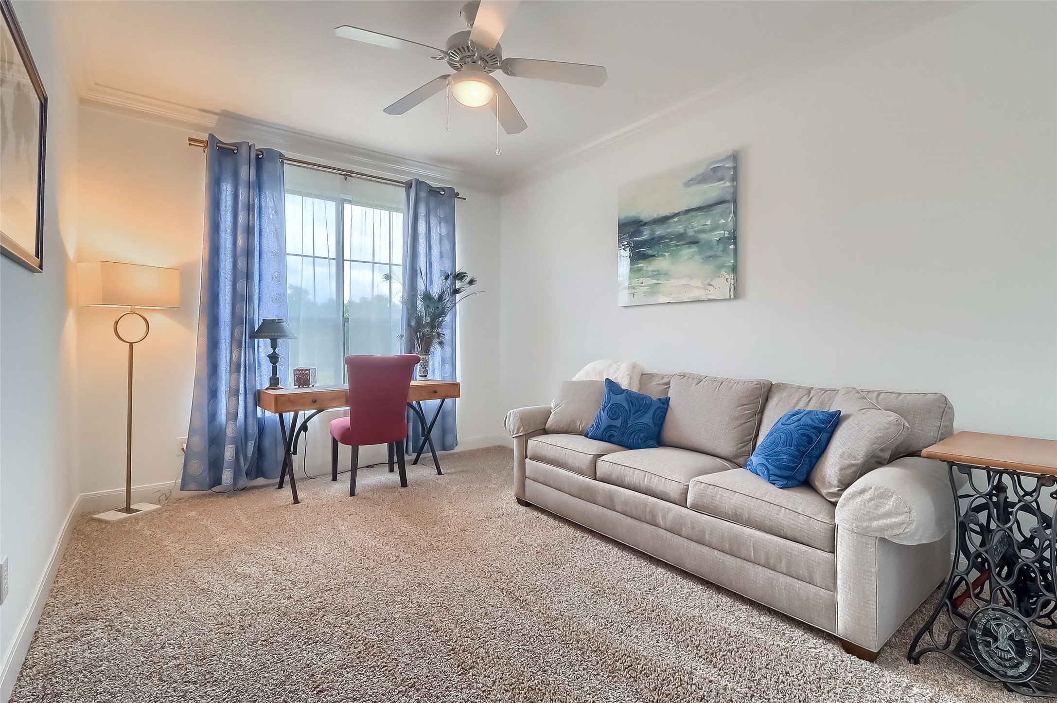 7701 Rialto Boulevard, Unit 1128 Austin, TX 78735 - Photo 18 of 35 a living room with furniture and a window