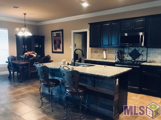 17745 Beech Ridge Avenue Baton Rouge, LA 70817 - Photo 8 of 24 KITCHEN ISLAND