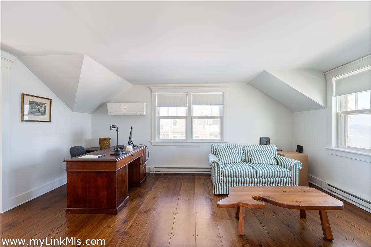 100 Baxter Road Nantucket, MA 02554 - Photo 6 of 11 a living room with furniture and a window