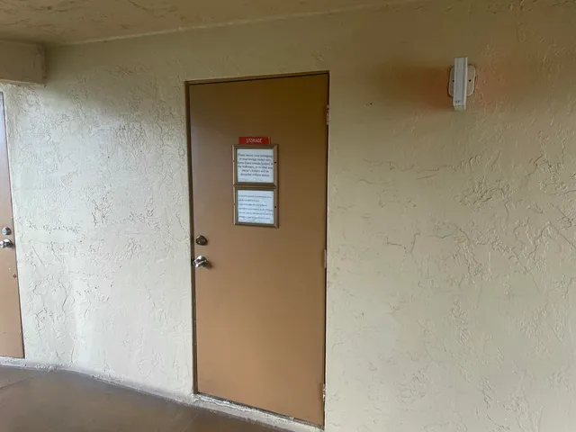 a view of swimming pool with a backyard