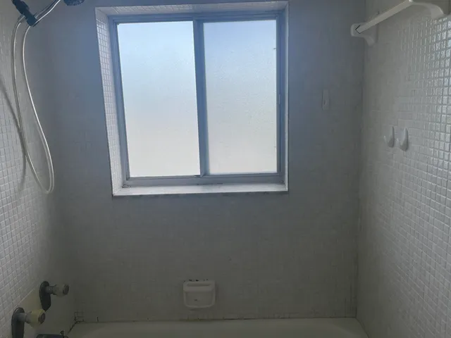 a bathroom with a window