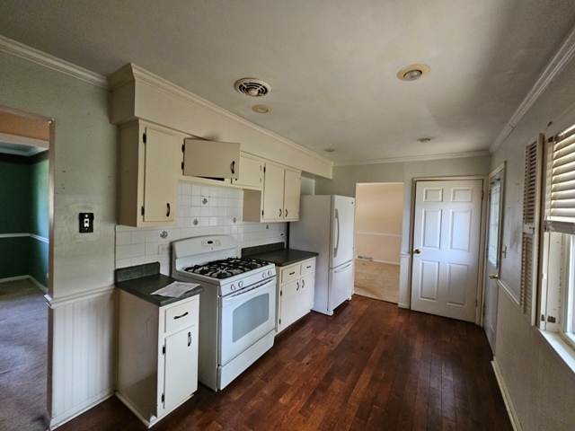 1004 Jenkisson Avenue Lake Bluff, IL 60044 - Photo 5 of 10 a kitchen with stainless steel appliances a white stove top oven and a refrigerator