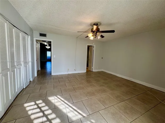 a view of outdoor space with deck and green space