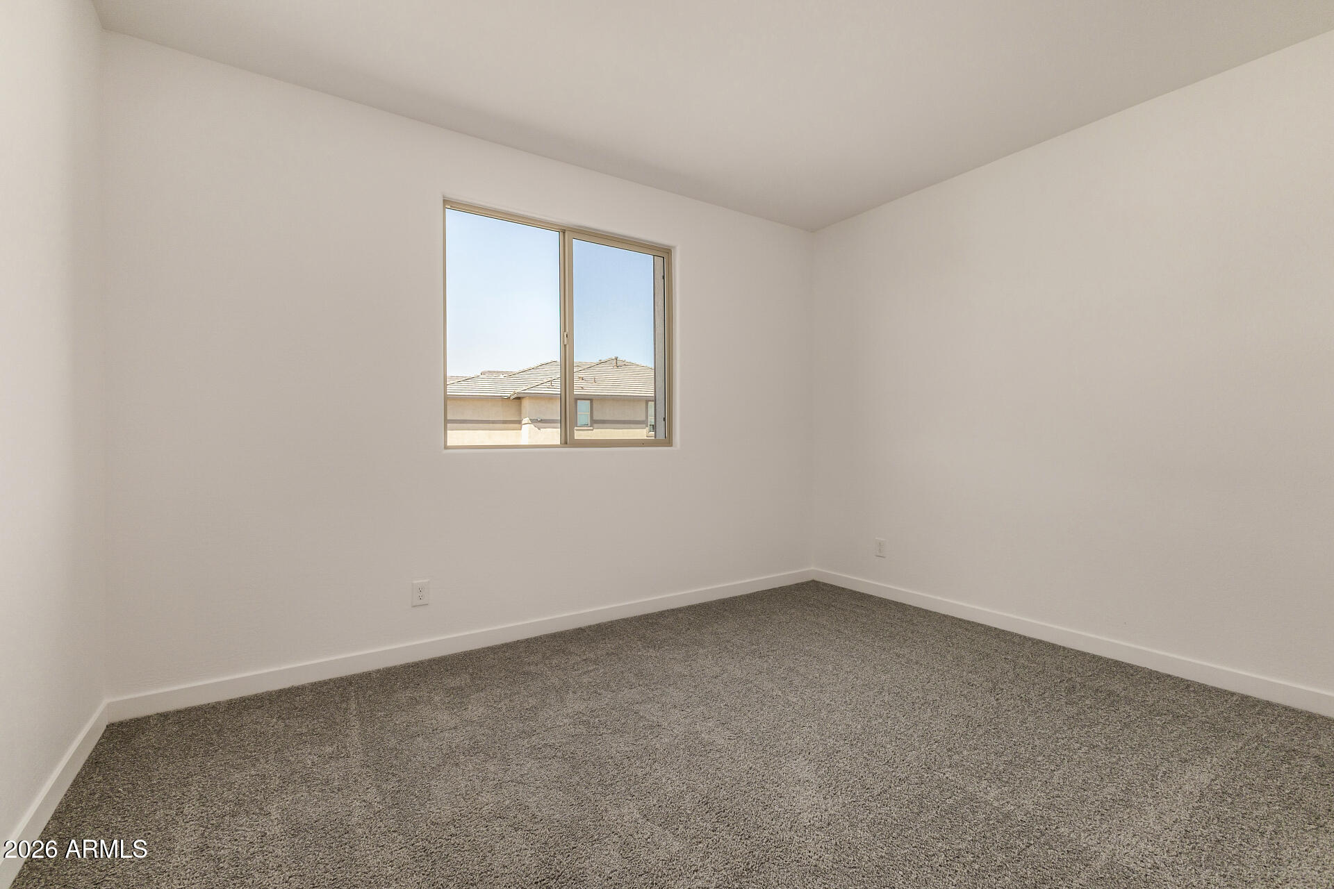 20618 West Thomas Road Buckeye, AZ 85396 - Photo 21 of 38 an empty room with a window