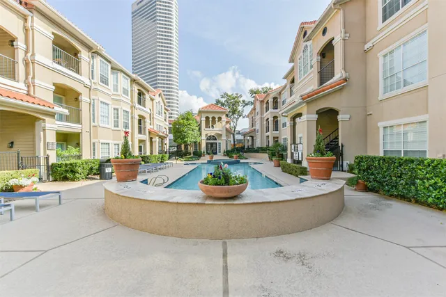 a view of a building with a street
