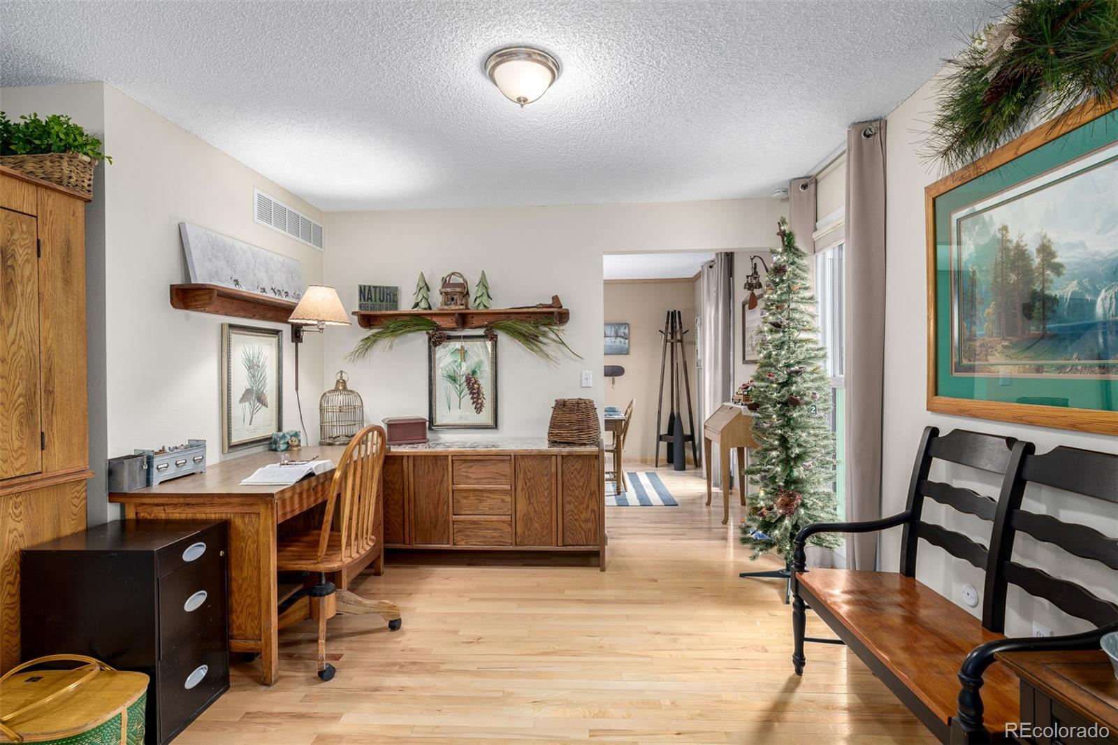 22 Scott Drive North Broomfield, CO 80020 - Photo 13 of 49 a view of a livingroom with furniture and windows