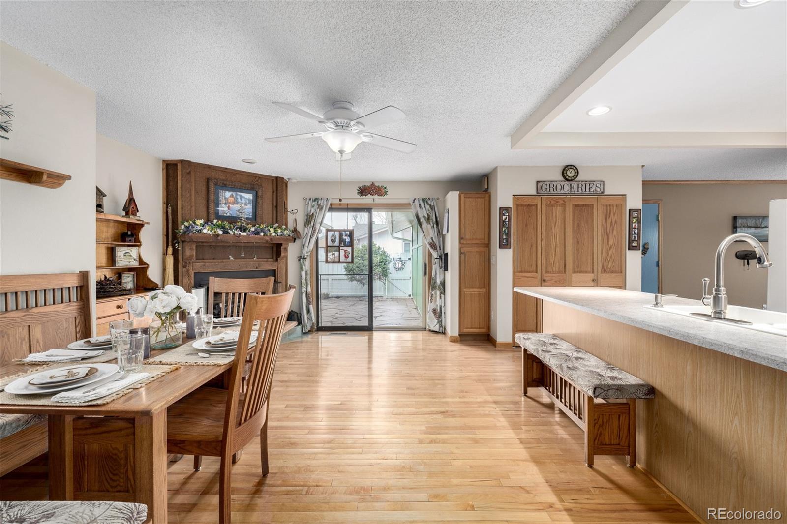 22 Scott Drive North Broomfield, CO 80020 - Photo 16 of 49 a living room with stainless steel appliances kitchen island granite countertop furniture and a kitchen view