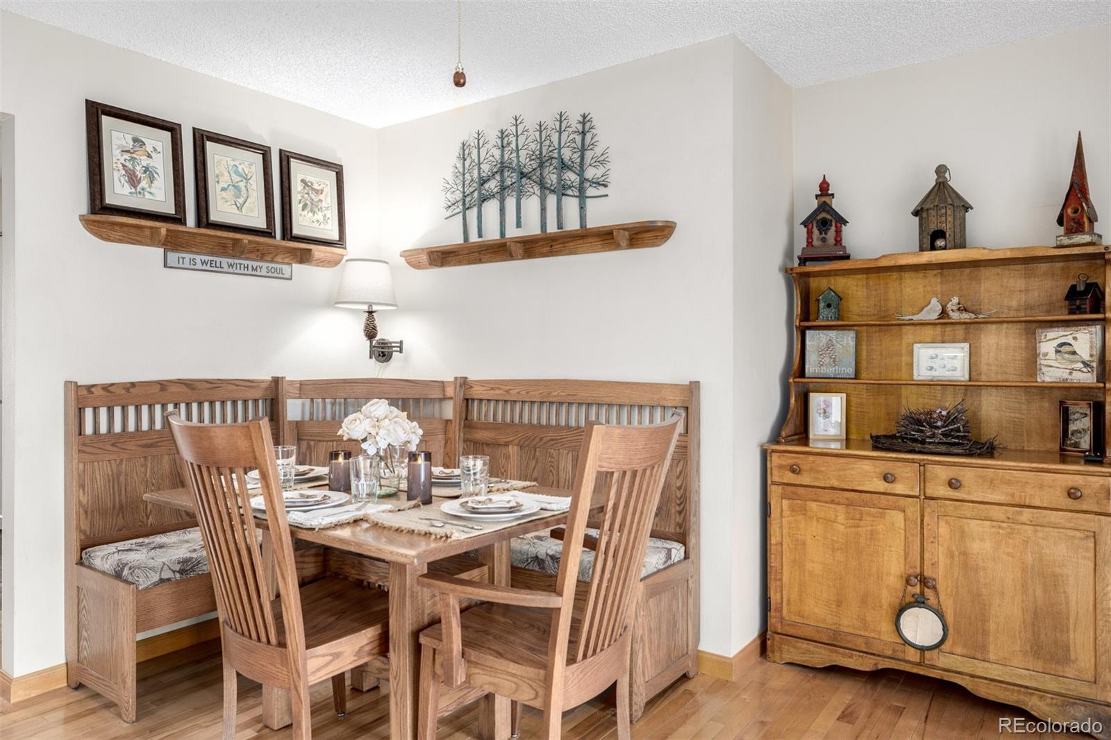 22 Scott Drive North Broomfield, CO 80020 - Photo 17 of 49 a view of a dining room with furniture and chandelier