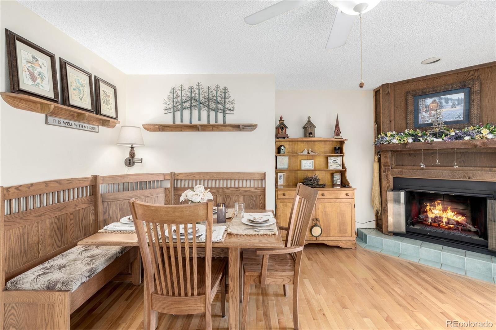 22 Scott Drive North Broomfield, CO 80020 - Photo 18 of 49 a view of a dining room with furniture window and wooden floor