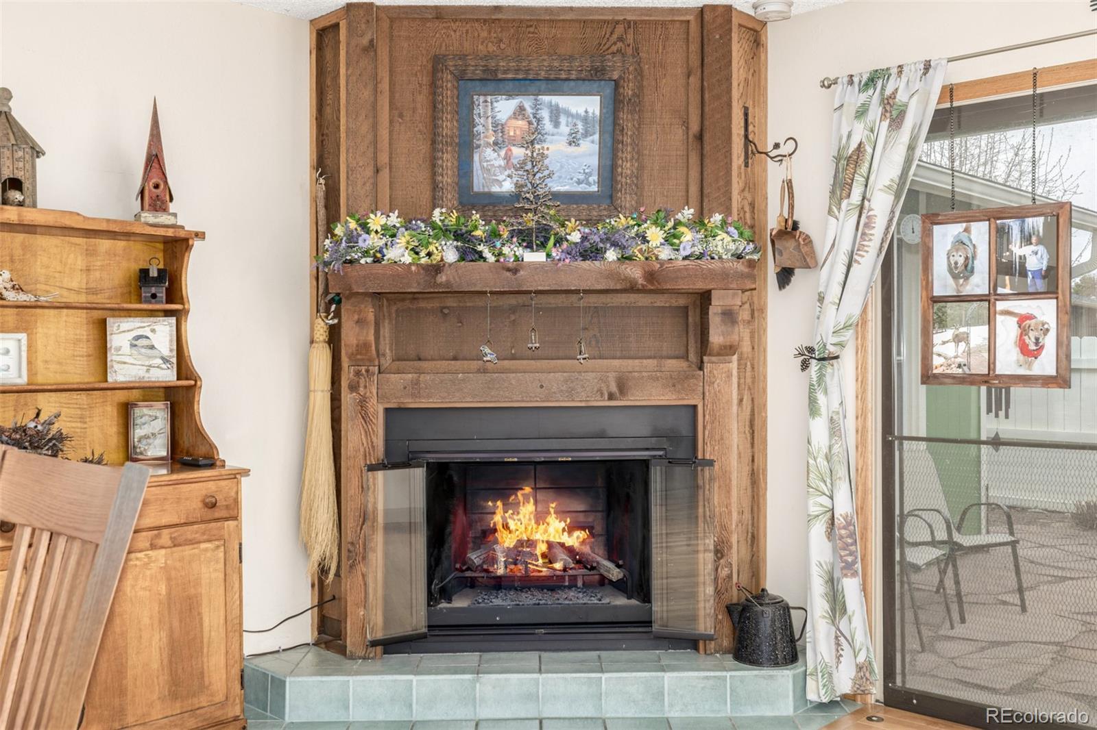 22 Scott Drive North Broomfield, CO 80020 - Photo 20 of 49 a living room with a fireplace and a fireplace