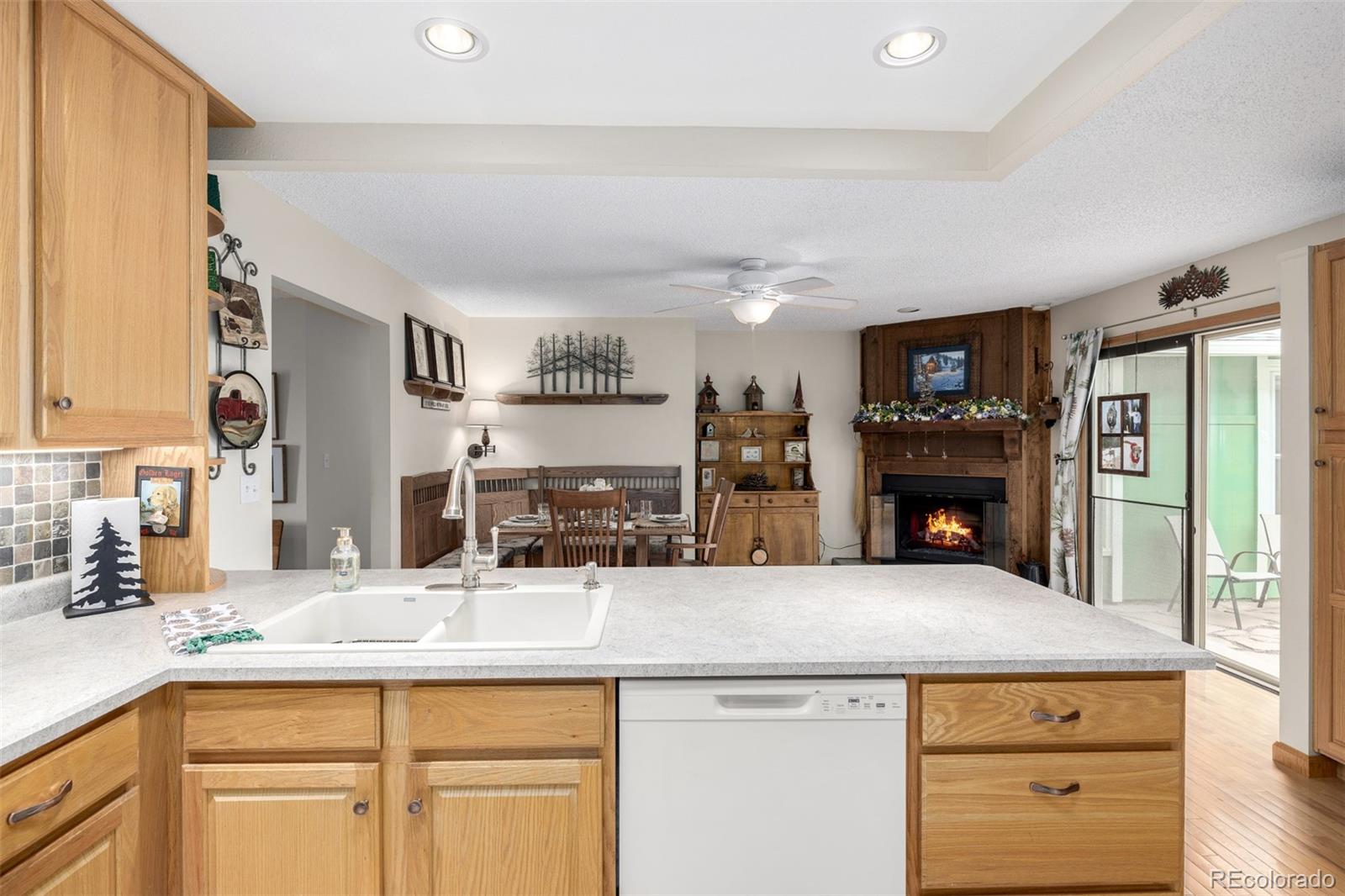 22 Scott Drive North Broomfield, CO 80020 - Photo 25 of 49 a kitchen with a sink and a refrigerator