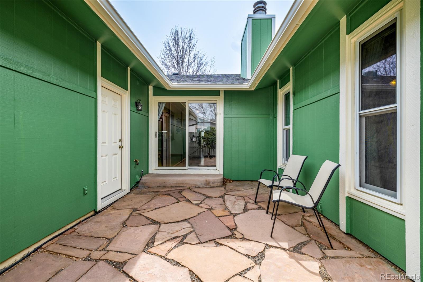 22 Scott Drive North Broomfield, CO 80020 - Photo 37 of 49 a view of an outdoor space with seating area
