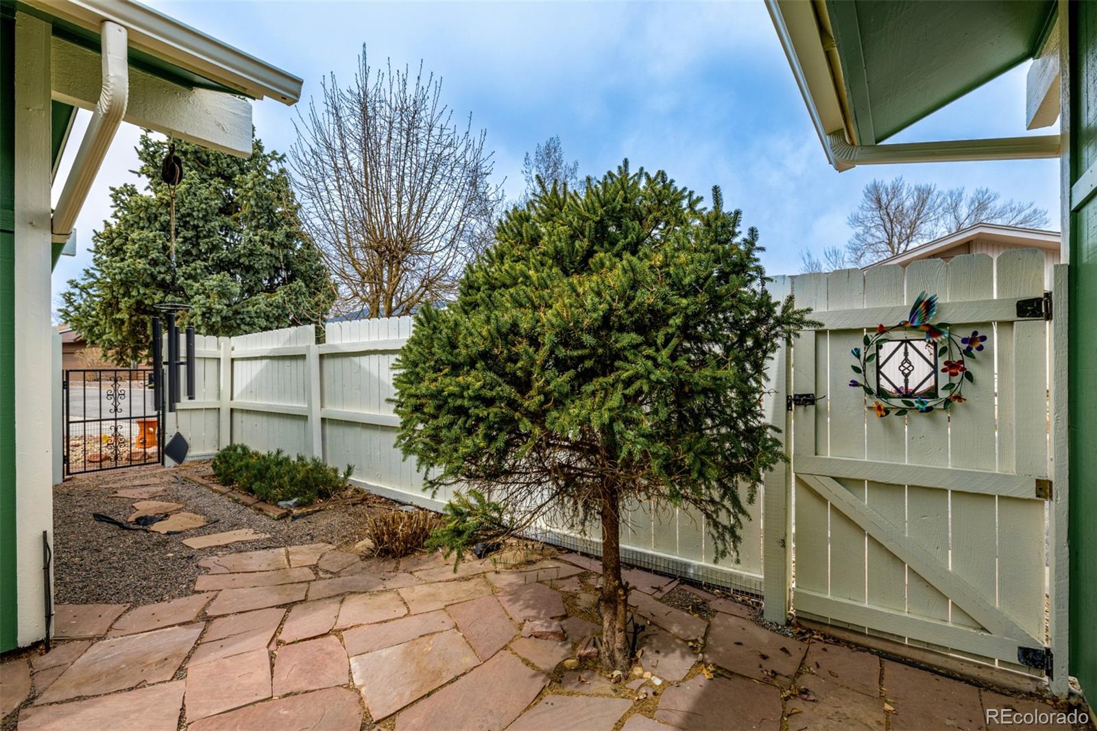22 Scott Drive North Broomfield, CO 80020 - Photo 38 of 49 a house with trees in front of it