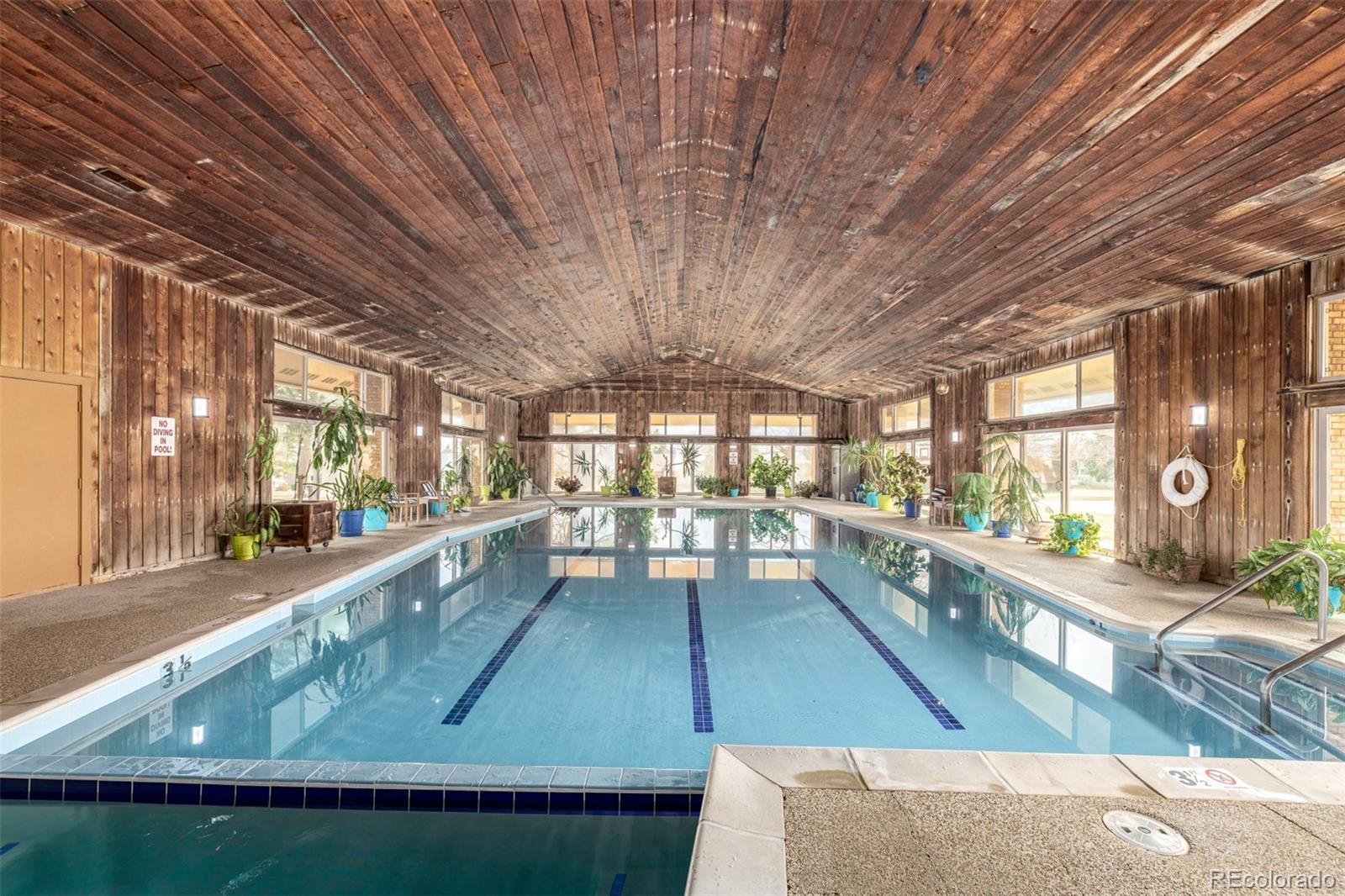 22 Scott Drive North Broomfield, CO 80020 - Photo 42 of 49 a large white kitchen with lots of counter space