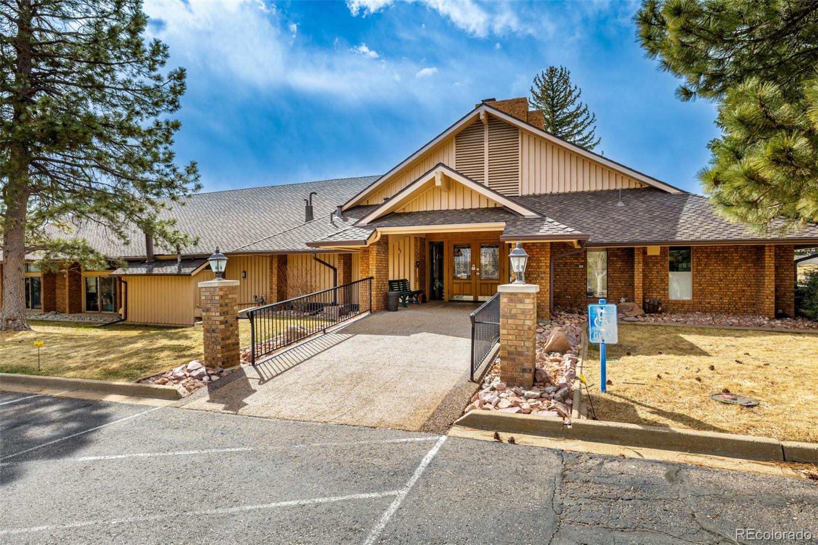 22 Scott Drive North Broomfield, CO 80020 - Photo 43 of 49 a front view of a house with a yard