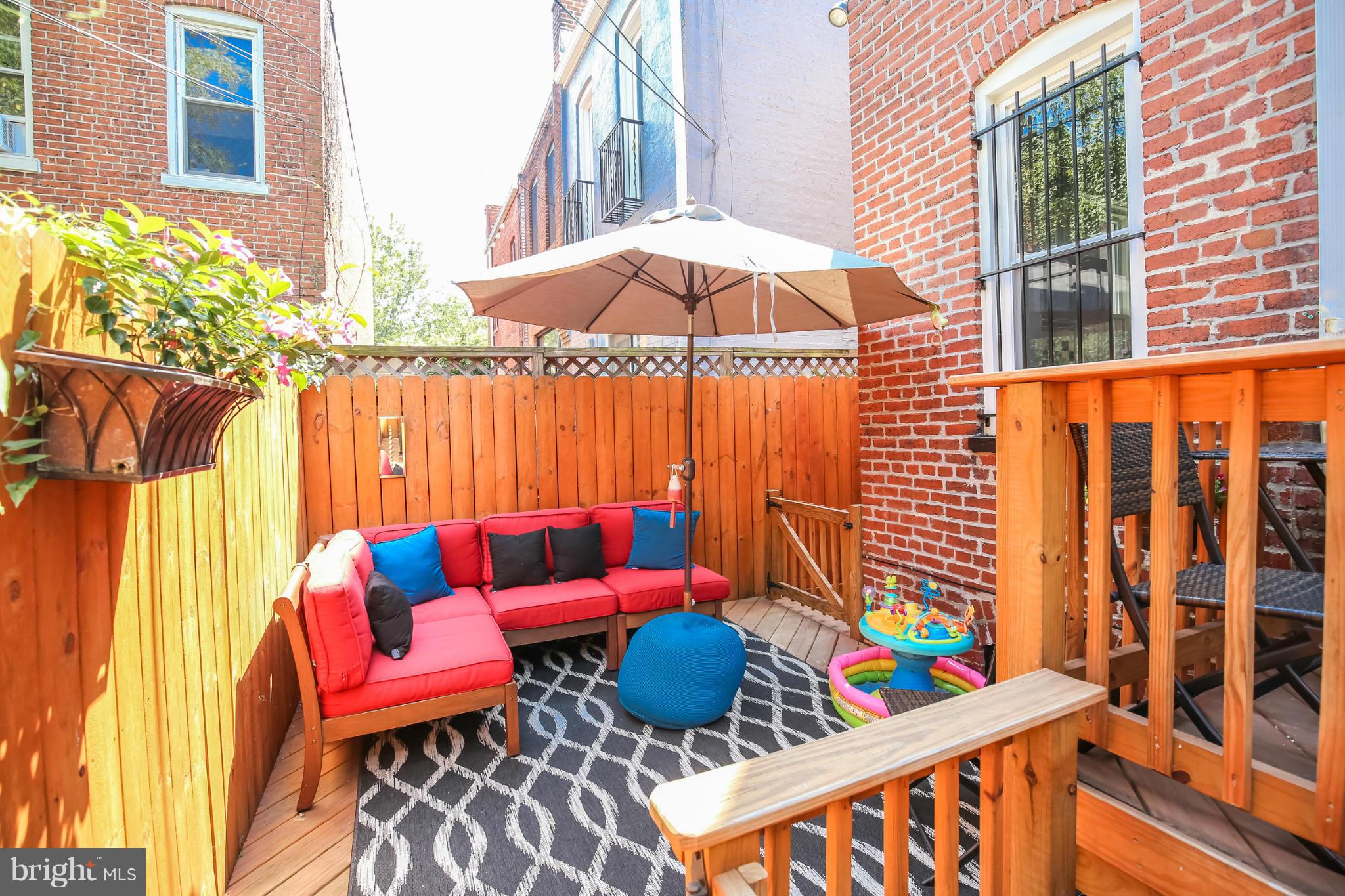252 8th Street Southeast Washington, DC 20003 - Photo 15 of 29 with outdoor seating space with furniture and umbrella