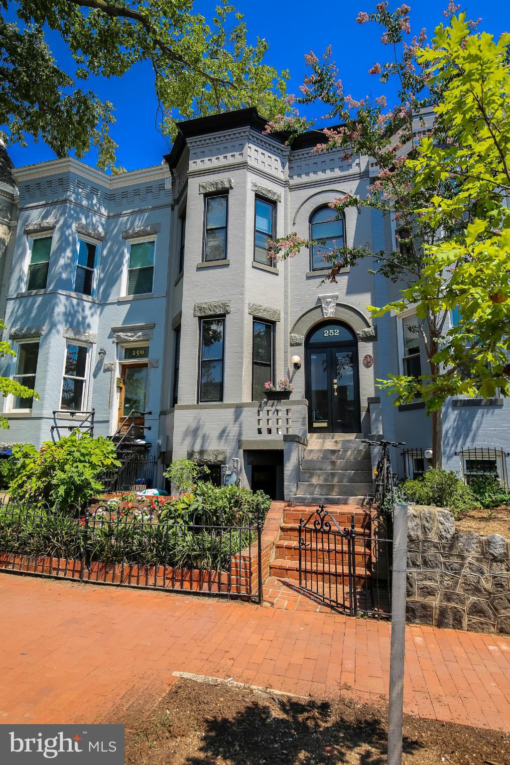 252 8th Street Southeast Washington, DC 20003 - Photo 29 of 29 a front view of a house with garden