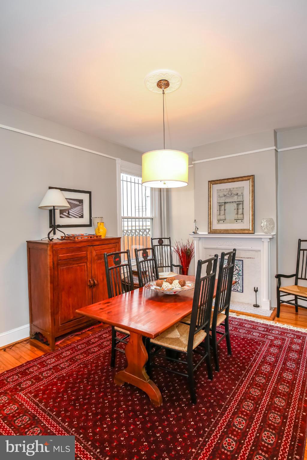 252 8th Street Southeast Washington, DC 20003 - Photo 8 of 29 a dining room with furniture and wooden floor