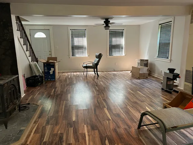 a utility room with cabinets washer and dryer