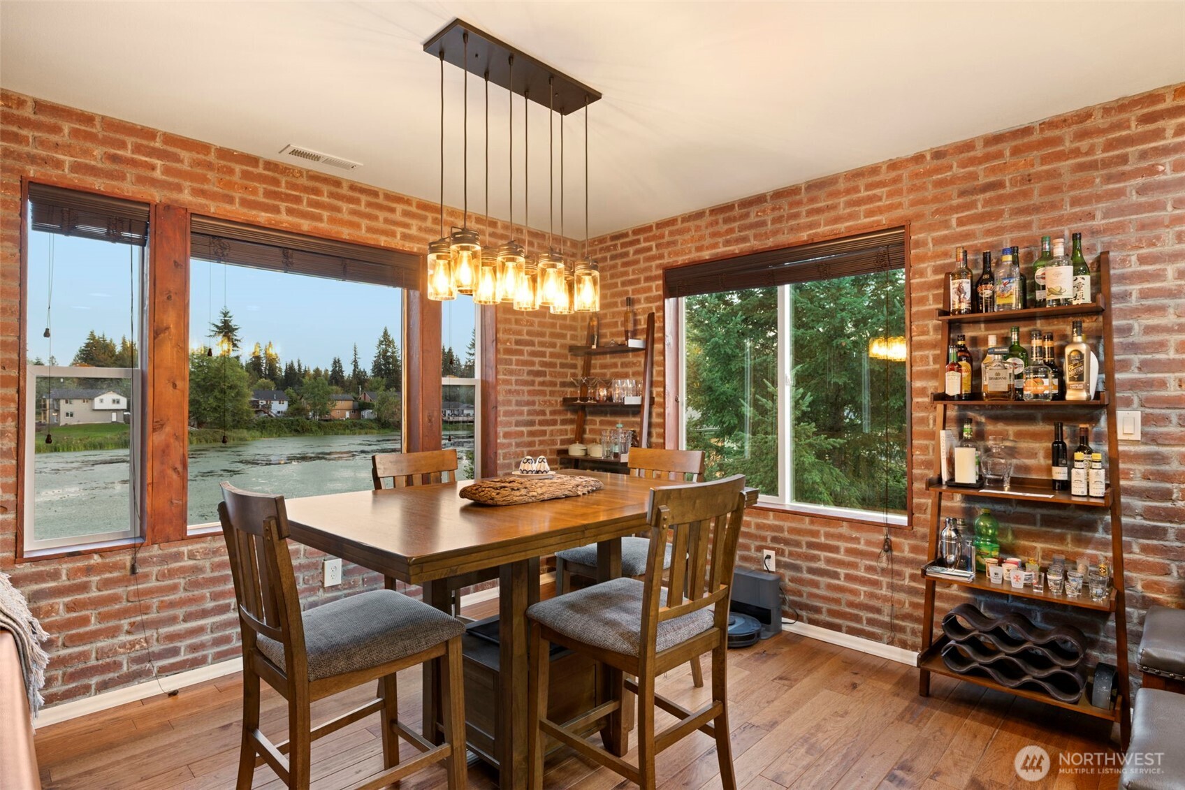 12203 Rainbow Road Arlington, WA 98223 - Photo 11 of 40 a view of a patio with a table chairs and backyard