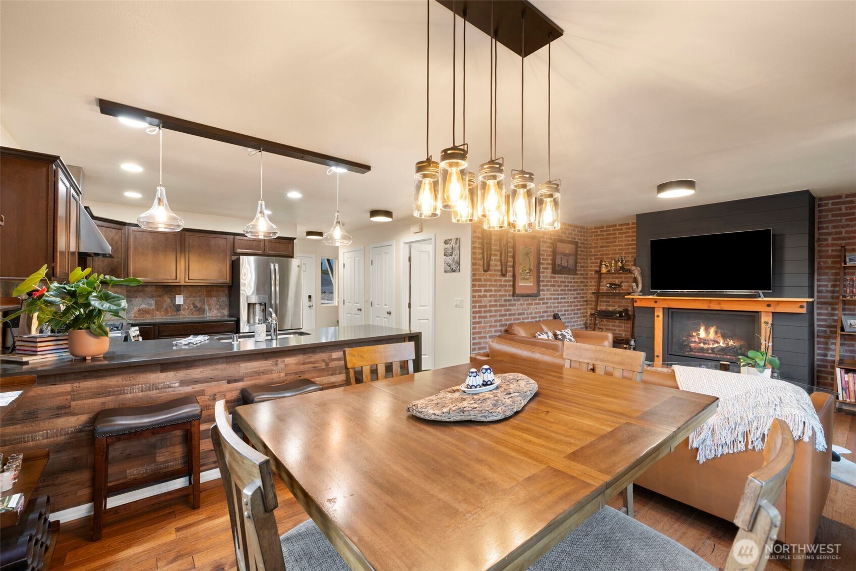 12203 Rainbow Road Arlington, WA 98223 - Photo 12 of 40 a living room with furniture and a flat screen tv