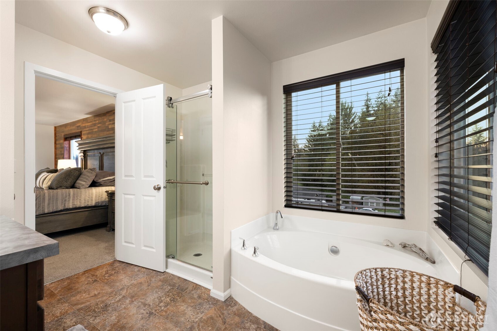 12203 Rainbow Road Arlington, WA 98223 - Photo 20 of 40 a bathroom with a tub shower and sink
