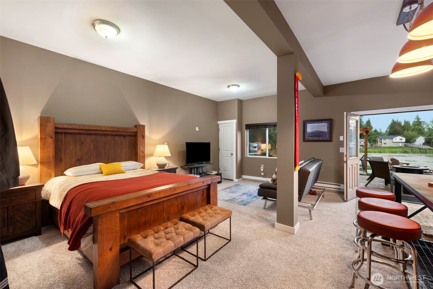 12203 Rainbow Road Arlington, WA 98223 - Photo 21 of 40 a bed room with a bed and furniture