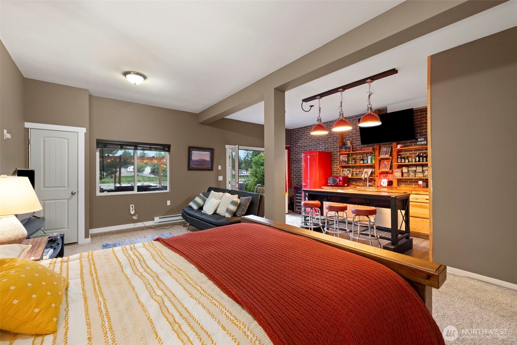 12203 Rainbow Road Arlington, WA 98223 - Photo 22 of 40 a bedroom with a bed and window