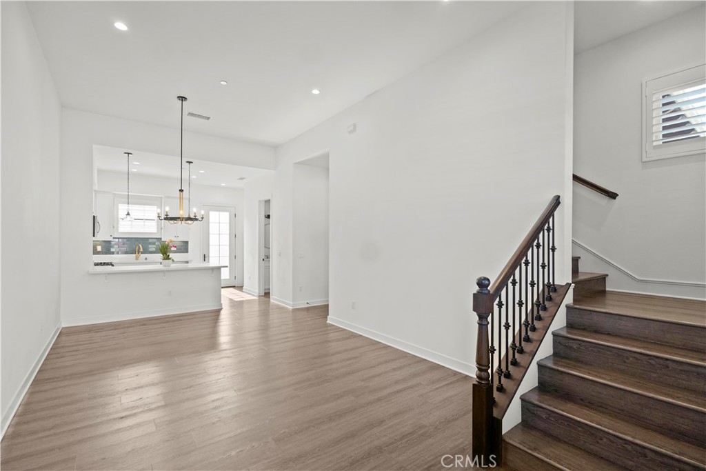 1672 3rd Street Duarte, CA 91010 - Photo 13 of 30 a view of a kitchen with wooden floor and electronic appliances