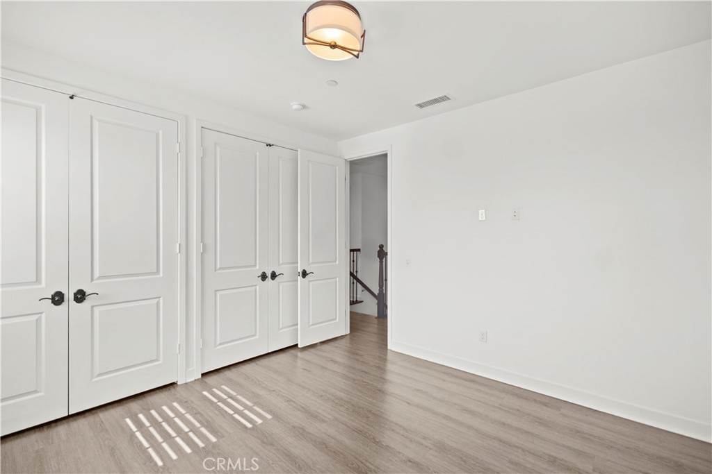 1672 3rd Street Duarte, CA 91010 - Photo 22 of 30 wooden floor in an empty room