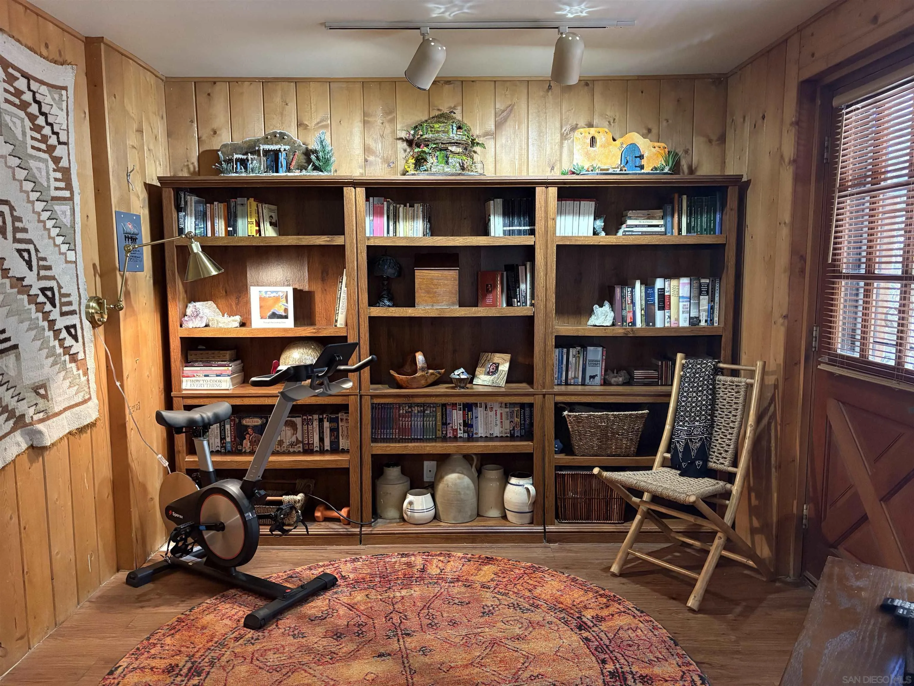22188 Crestline Road Palomar Mountain, CA 92060 - Photo 35 of 69 a view of a workspace with bookshelf and a window
